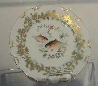 Antique Limoges fish plates by Tresseman Vogt