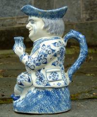 Antique Dutch delft pottery toby mug in blue and white