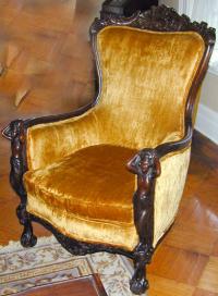 Three piece Italian upholstered parlor set with carved heads