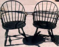 Pair of black painted American Windsor Sach back arm chairs c1790