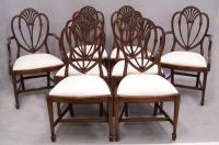 Eight American Hepplewhtie style wheat carved dining chairs