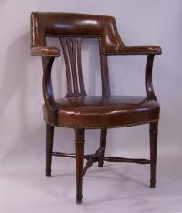 English leather and mahogany desk arm chair c1820