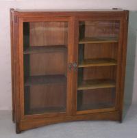 Paine Arts and Crafts quarter sewn oak double door bookcase