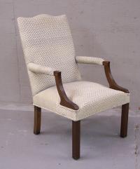 Mahogany upholstered lolling arm chair c1900