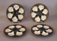 Set of four French Majolica oyster plates c1920