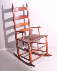 Early American ladder back rush seat rocker with arms c1760