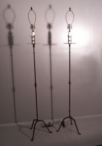Pair of wrought iron arts and crafts floor lamps c1910