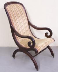 Victorian Walnut Upholstered Chair with rolled arms.