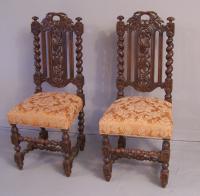 Pair English Jacobean style carved oak tall back side chairs
