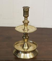 Single two tier 17thc Flemish brass candlestick
