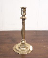 Single brass 16th century French candlestick c1670