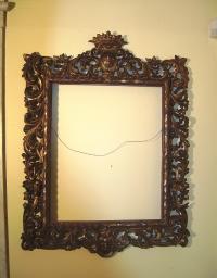 Early hand carved french hanging wall mirror with crest c1800