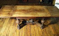 German Renaissance oak drawer table with carved lion