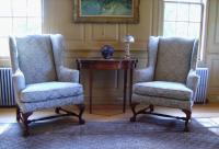 Pair Baker museum reproduction upholstered Queen Anne wing chairs