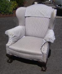 Victorian claw foot upholstered wing chair c1900