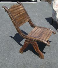 Early Asian teak lounge chair