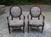 Pair French 18th c upholstered walnut arm chairs c1780