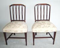 Pr Regency upholstered pierce carved mahogany chairs
