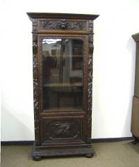 19th century carved oak bookcase with lions heads c1850