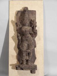 Asian hand carved architectural figure