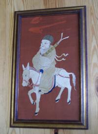 Chinese silk embroidery of a man on a horse