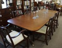 Vintage Baker furniture mahogany dining room table with three leaves