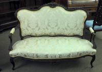 Finely carved mahogany upholstered settee c1890