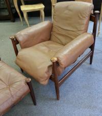 Vintage Mid Century Modern rosewood arm chair and ottoman