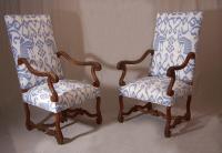 Pair of Louis XlV period walnut arm chairs