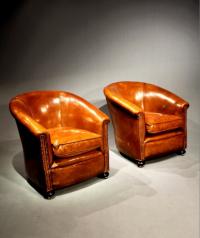 Vintage pair of Art Deco leather tub chairs c1920