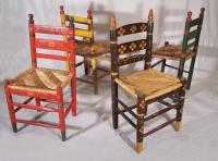 Set of four Mexican painted chairs with rush seats