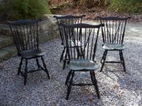 Set of four vintage brace back Windsor chairs by Peter A Blekis