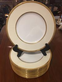 12 Minton white porcelain dinner plates with gold rims