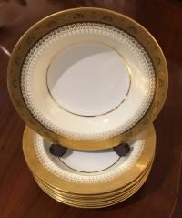 Eight Minton porcelain soup plates