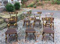 Seven early American painted maple tablet top chairs c1810