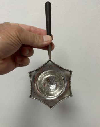 Image of Antique sterling silver tea strainer with wood handle