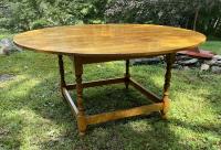 Tiger maple round dining table by J L Treharn