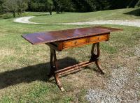English Regency style yew wood library table