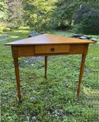 Rare Eldred Wheeler tiger maple corner table with drawer