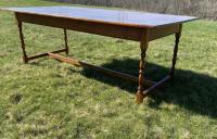Large tiger maple dining table with trestle base