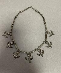 Native American Navaho sterling silver Yei figure necklace