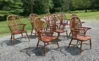 Eight English elm Windsor arm chairs