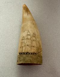 Antique scrimshaw whales tooth with whaling ship