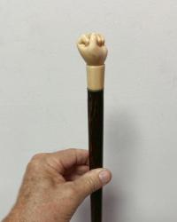 Antique scrimshaw fist top walking stick with calamander shaft