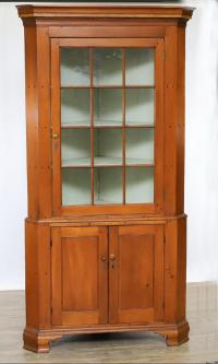 Early Pennsylvania pine corner cupboard