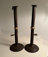 Early American hog scraper push up candlesticks