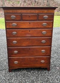 Federal period tall chest with oval inlay dated 1809