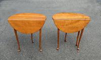 Two Eldred Wheeler tiger maple tables in Queen Anne style