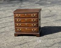 Small black walnut chest by Henkel Harris