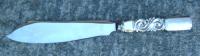 Early Georg Jensen silver scroll cake server